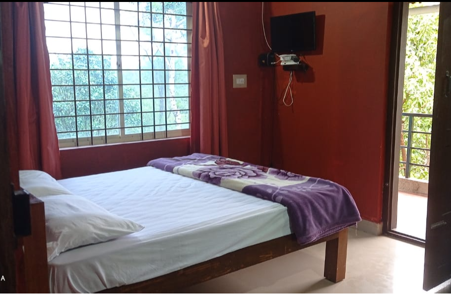 Prajatha Home Stay | Deluxe Room